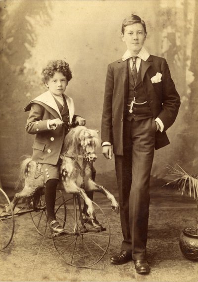 Young Boy on His Horse Mounted as a Tricycle, His Older Brother Alongside, 1880s by J. H. Killick