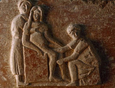 A relief from the tomb of a Roman man and wife shows a woman giving birth. Museo Archeologico. by James L Stanfield