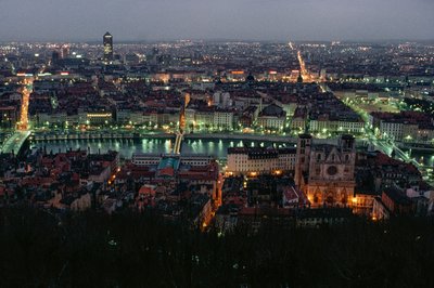 A view of Lyon between the Pont de la Feuillite, the Pont Bonaparte at twilight by James L Stanfield
