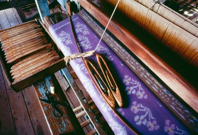 Close view of a piece of silk textile on a loom, Myamlar Silk Factory, Inpawkhon by James L Stanfield