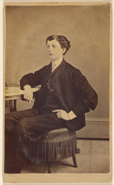 Unidentified Young Man Seated at a Table by James S. Woodley