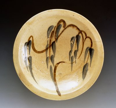 Enamel stoneware plate used by nishin-zara sellers (stewed herring) decorated with willow tree by Japanese School