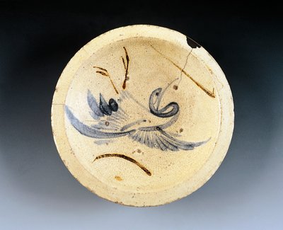 Enamel stoneware plate used by nishin-zara sellers (stewed herring) decorated with crane figures dancing between willow branches by Japanese School