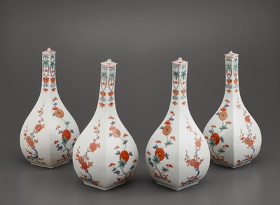 Four square bottles with lids by Japanese School
