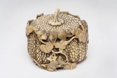 Okimono carved as four playful rats jumping over a pumpkin by Japanese School
