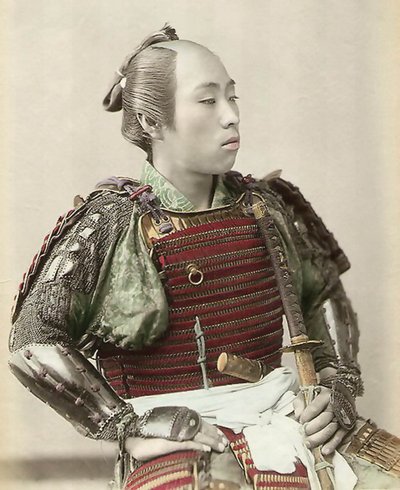 Portrait of a Samurai of Old Japan armed with full body armour, 1890 by Japanese School