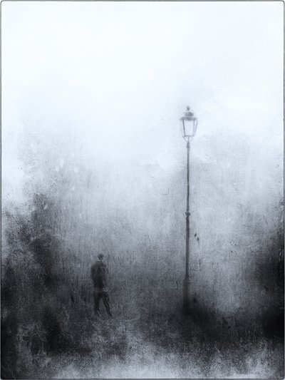 Lonely Figure Under Lamp by Jeffrey Hummel
