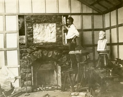 Karl Bitter (sculptor) building his fireplace himself by Jessie Tarbox Beals