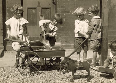 Young Children Loading Gravel into a Cart by Jessie Tarbox Beals