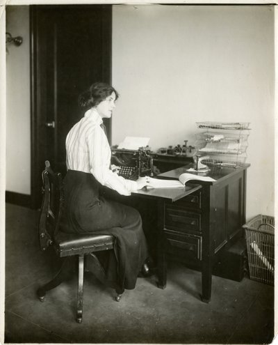 Model with typewriter, c.1905-18 by Jessie Tarbox Beals