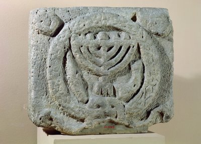 Relief depicting a menorah, from Umm Qeis (Ancient Gadara) Jordan by Jewish School