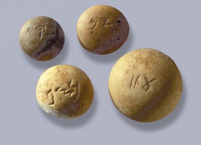 Weights, inscribed with their weight in shekels, from Jerusalem by Jewish School