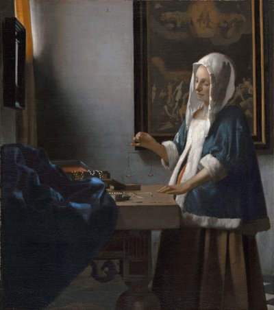 Woman Holding a Balance by Johannes Vermeer