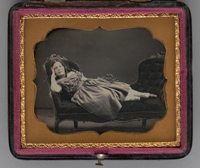 Untitled portrait of a girl reclining on a chaise longue by John Adams Whipple