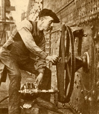 A Pneumatic Riveter Cutting Portholes in the Side of a Liner, c. 1930 by John Brown and Company
