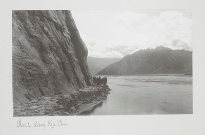 Road along Kyi Chu, Troops on the riverbank by John Claude White