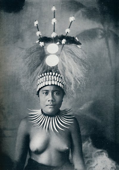 A Samoan woman wearing a collar of cachalots teeth and a ceremonial headdress by Josiah Martin
