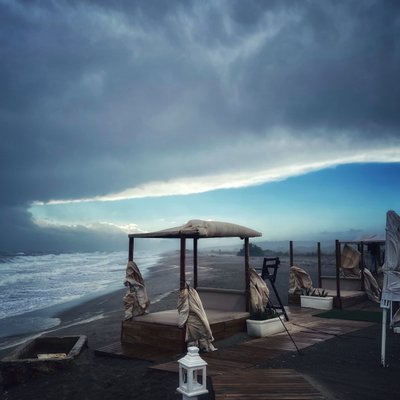 Surreal Stormy Sky Winter Beach by Katha Wood
