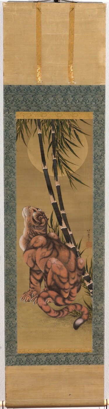 Tiger among the bamboo looking at the full moon by Katsushika Hokusai
