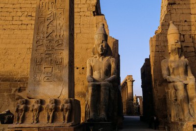 Colossal statue of Ramses II (the Great), in front of pylon, Temple of Luxor by Kenneth Garrett