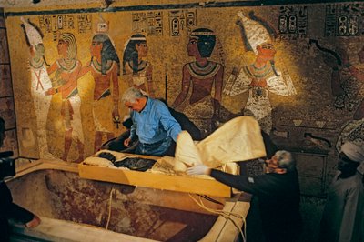 Dr. Zahi Hawass and Egyptian Research Team Remove Mummy of King Tut from His Tomb, 2005 by Kenneth Garrett