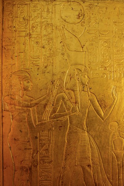 Gold shrine surrounding sarcophagus depicts Goddess Isis by Kenneth Garrett