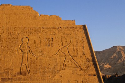Ramses III smiting enemies, main temple, pylon, Medinet Habu, New Kingdom, Egypt by Kenneth Garrett