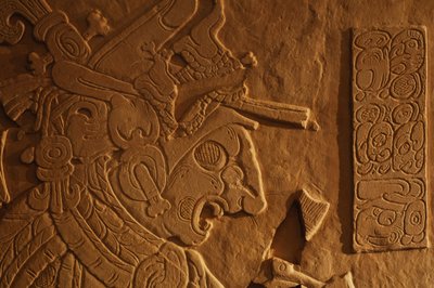 Temple 21 throne bench, carving of king Akhal Mo Nab, Palenque, Mexico, 2005 by Kenneth Garrett