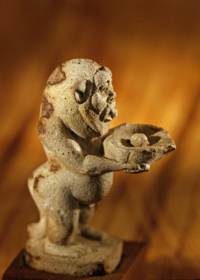 Unguent Vessel in shape of God Bes; reign of Tutankhamun or Akhenaten by Kenneth Garrett