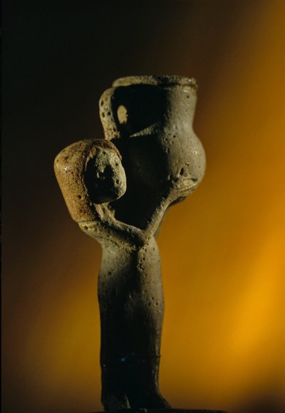 Unguent Vessel, shape of female servant by Kenneth Garrett