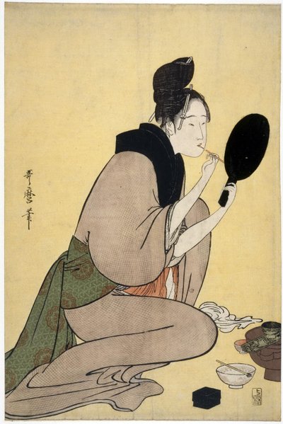 Girl Applying Makeup to Her Lips by Kitagawa Utamaro