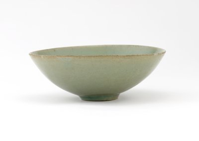 Bowl with molded design of fish among waves by Korean School