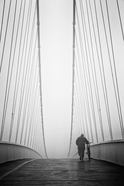 Solitary Walk on Bridge by Krunoslav Nevistic