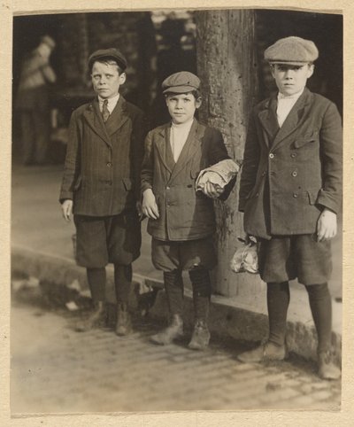 Three Boys on City Street in Knickers and Caps by Lewis W. Hine