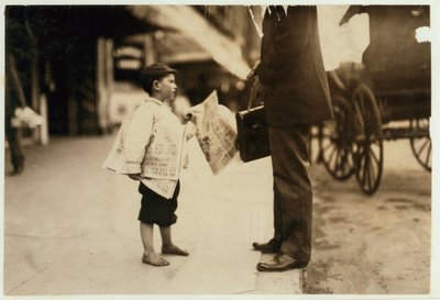 6 year old newsboy Hyman selling papers until 6 p.m. in Lawrence, Massachusetts, 1911 by Lewis Wickes Hine