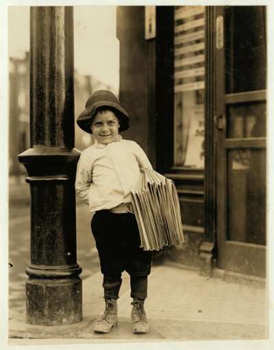 6 year old newsboy, known as Little Fattie and only 3 ft 4 ins tall, has been working for a year in St. Louis, Missouri, 1910 by Lewis Wickes Hine
