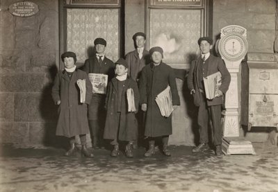 8:30 P.M. Group of Newsboys Selling at the Depot, Hartford, Connecticut. Smallest Boy 11 Years Old. by Lewis Wickes Hine