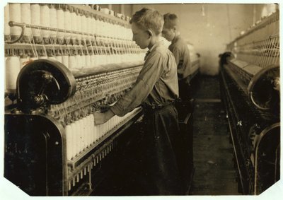 Doffers replacing full bobbins at Indian Orchard Cotton Mill, Massachusetts by Lewis Wickes Hine