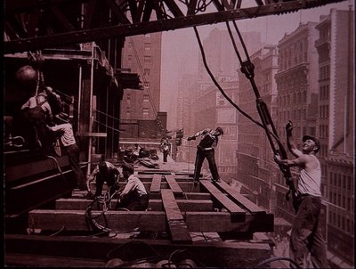 Empire State Building under construction, showing a lifting gang at work by Lewis Wickes Hine