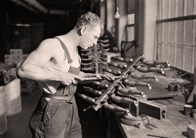 Factory worker at the Paragon Rubber Company, Massachusetts by Lewis Wickes Hine
