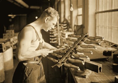 Factory Worker at the Paragon Rubber Company, Massachusetts, 1936 by Lewis Wickes Hine