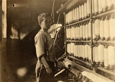 John Dempsey, 11 or 12 years old, Saturday worker in the mule-spinning room at Jackson Mill, Fiskeville, Rhode Island, 1909 by Lewis Wickes Hine