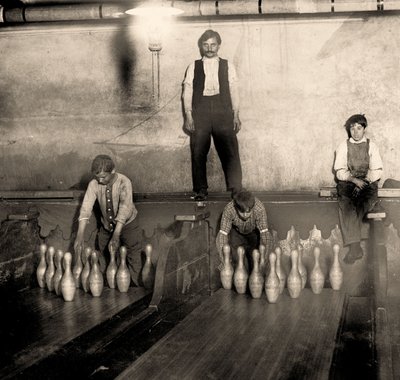 Pinboys in a Subway bowling alley, 65 South Street, Brooklyn. New York. 1910 by Lewis Wickes Hine