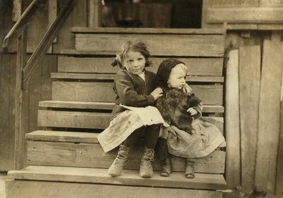 Portrait of Young Girl Taking Care of Baby Sister While Rest of Family is Working at Local Cannery, Bayou La Batre, Alabama, USA by Lewis Wickes Hine