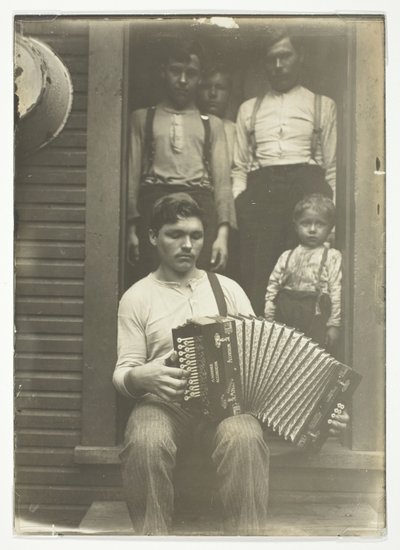 Slovak Steel Worker in the Pittsburgh Region Relaxes after Supper by Lewis Wickes Hine