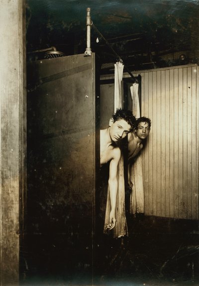 Telegraph boys using shower baths, Postal Tel. Co., Broadway, New York, 1910 by Lewis Wickes Hine