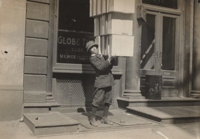 Wagon Boy or Tail Boy Helping to Load the Wagon by Lewis Wickes Hine