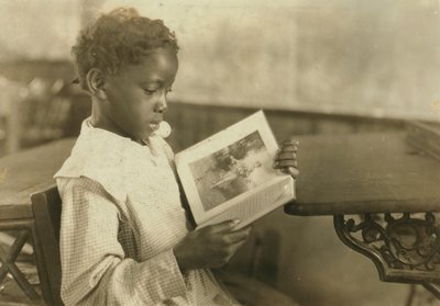 Young Girl Reading Book in Classroom, Pleasant Green School, Marlinton, Pocahontas County, West Virginia, USA, c.1921 by Lewis Wickes Hine