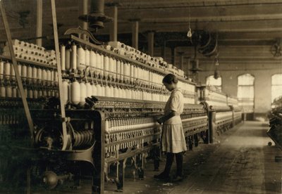 Young Teen Girl Working as Spinner at Cotton Mill, West, Texas, USA by Lewis Wickes Hine