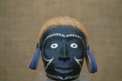 Male head with earrings, sculpture by Unbekannt Unbekannt
